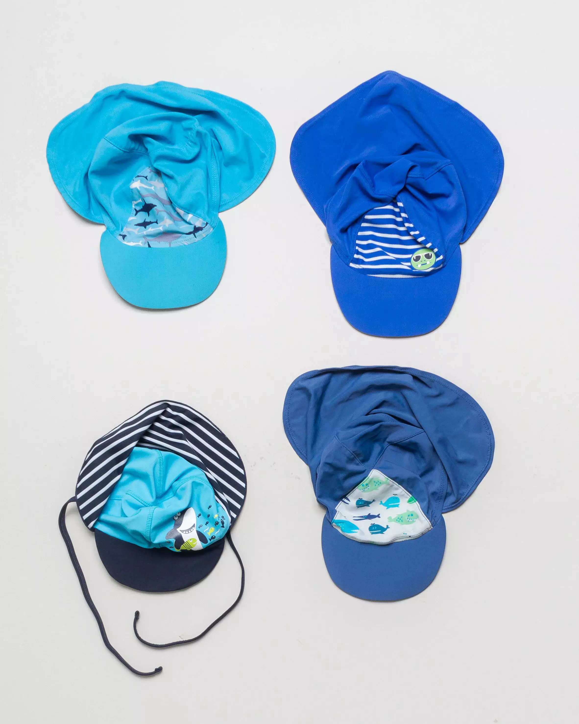 1x UV Schutz Mütze Gr. 74/80 – maritim Haifische Streifen Fisch blau Sonnehut Sonnenmütze