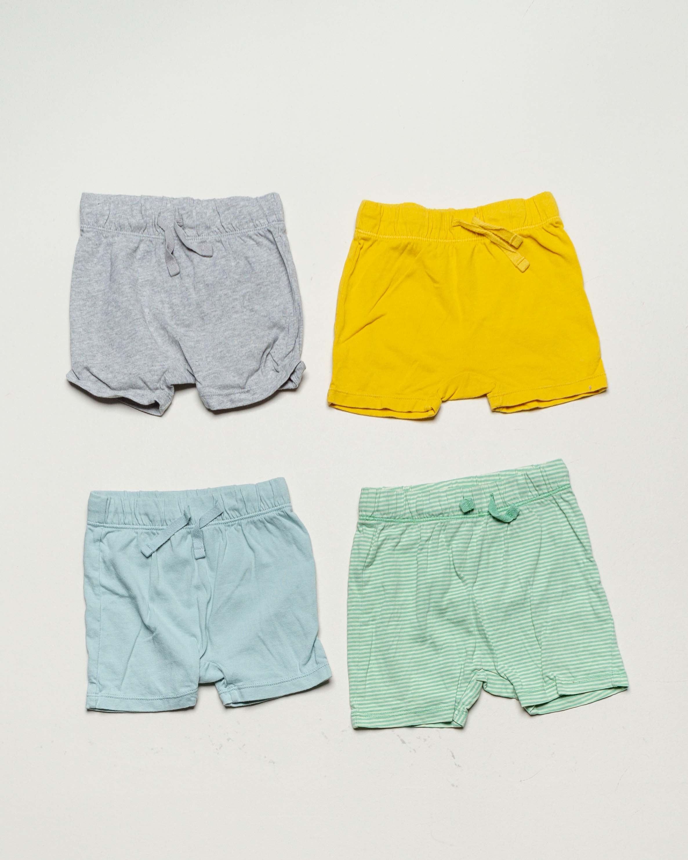 4 Shorts Gr. 68 – pastell – ohne rosa Mädchen Jungen Set Pack