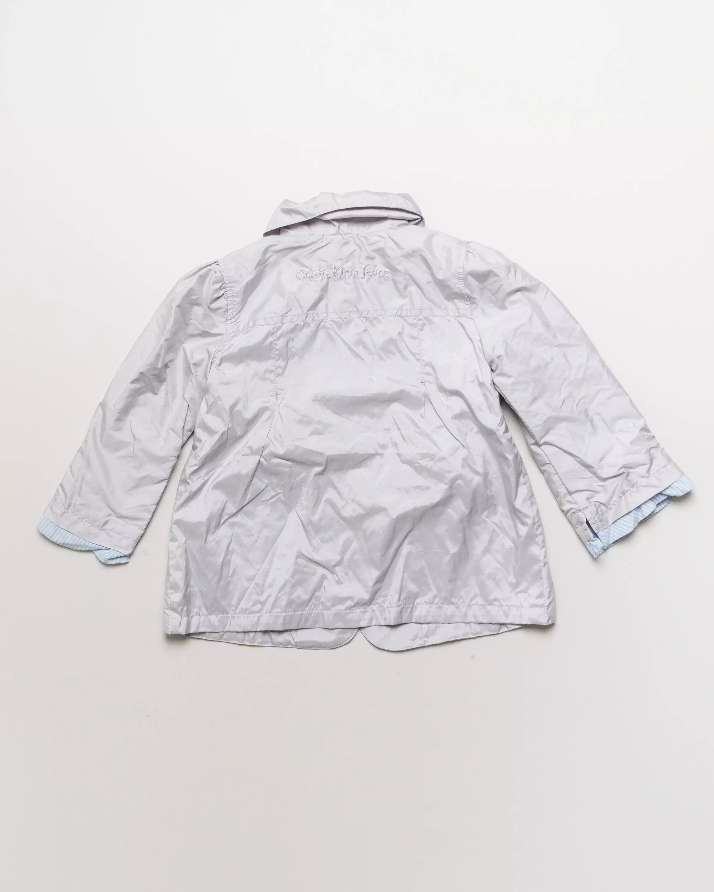 Jacke Gr. 98/104 – Calvin Klein Jeans silber Trenchcoat Blütenfutter innen